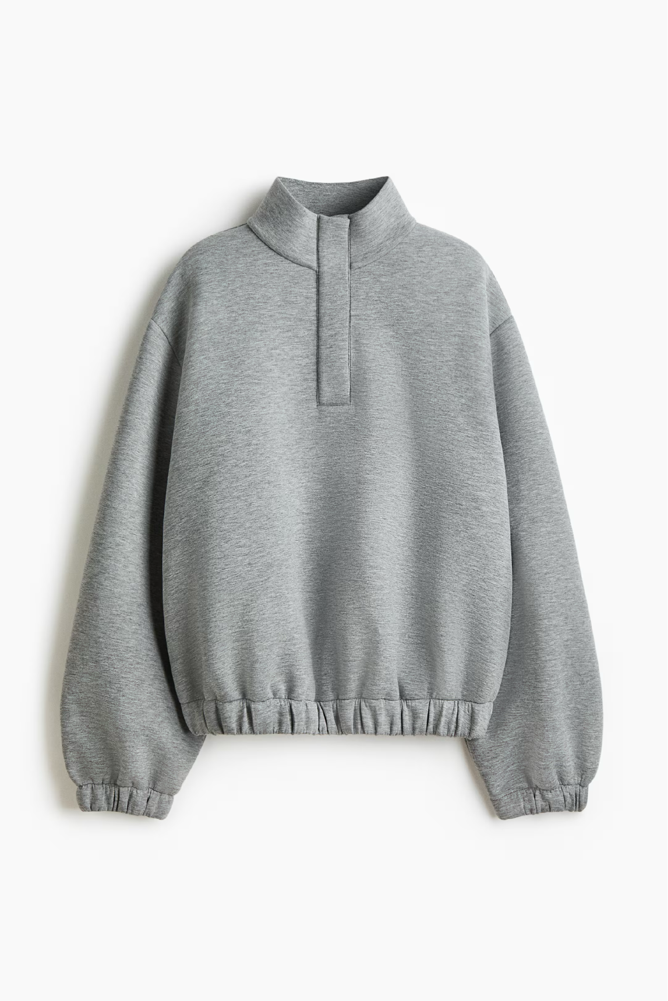 A grey sweatshirt with a half zip